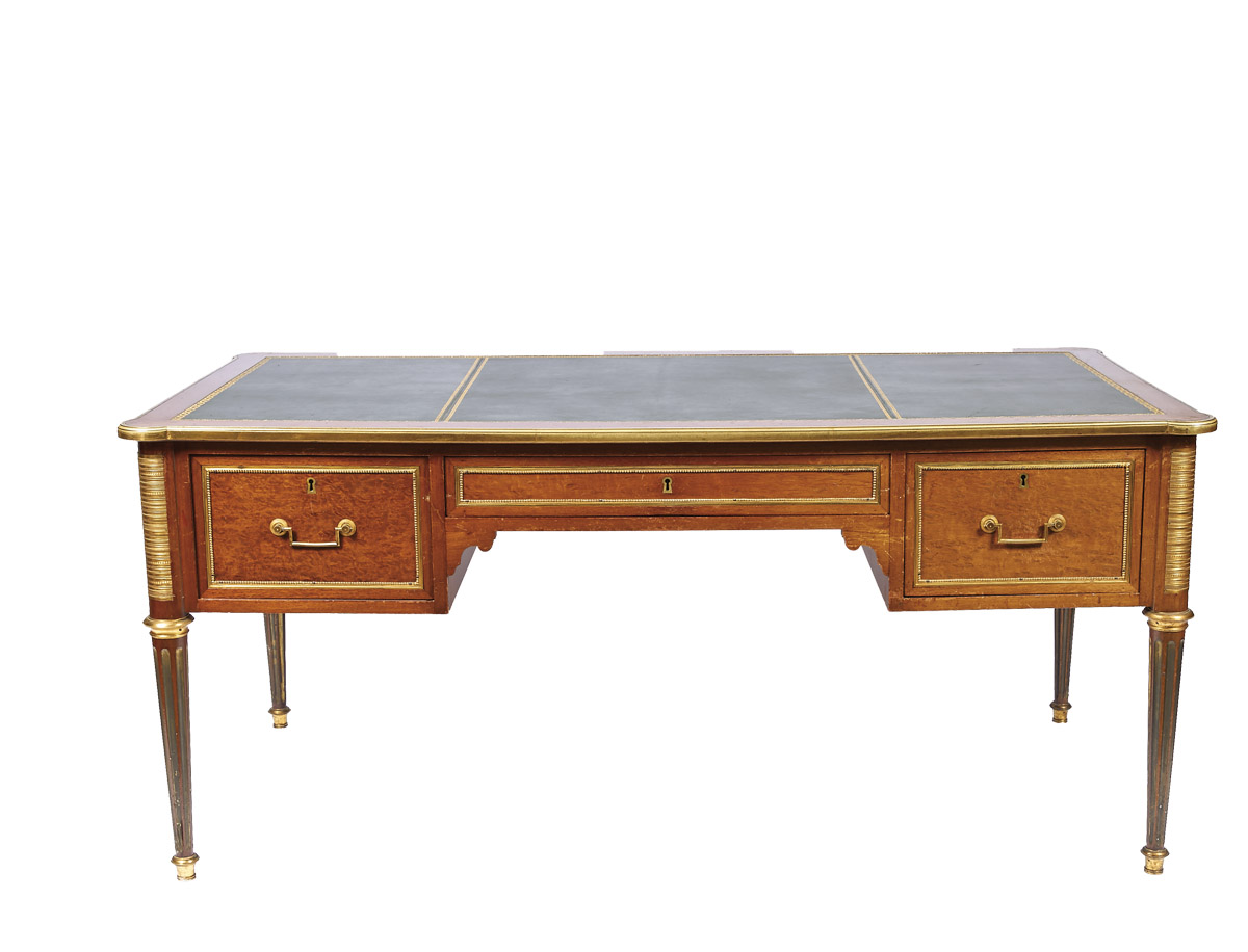 A Bureau with side stretchers,Louis XVI style, mahogany and walnut veneer, gilt bronze applications,