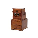 A Slide Viewer, mahogany case, slides on glass, European, 19th/20th C., traces of wood insects,