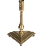 A Candlestick with Triangular Base, mannerist, yellow metal, Iberian, 17th C., signs of use, small