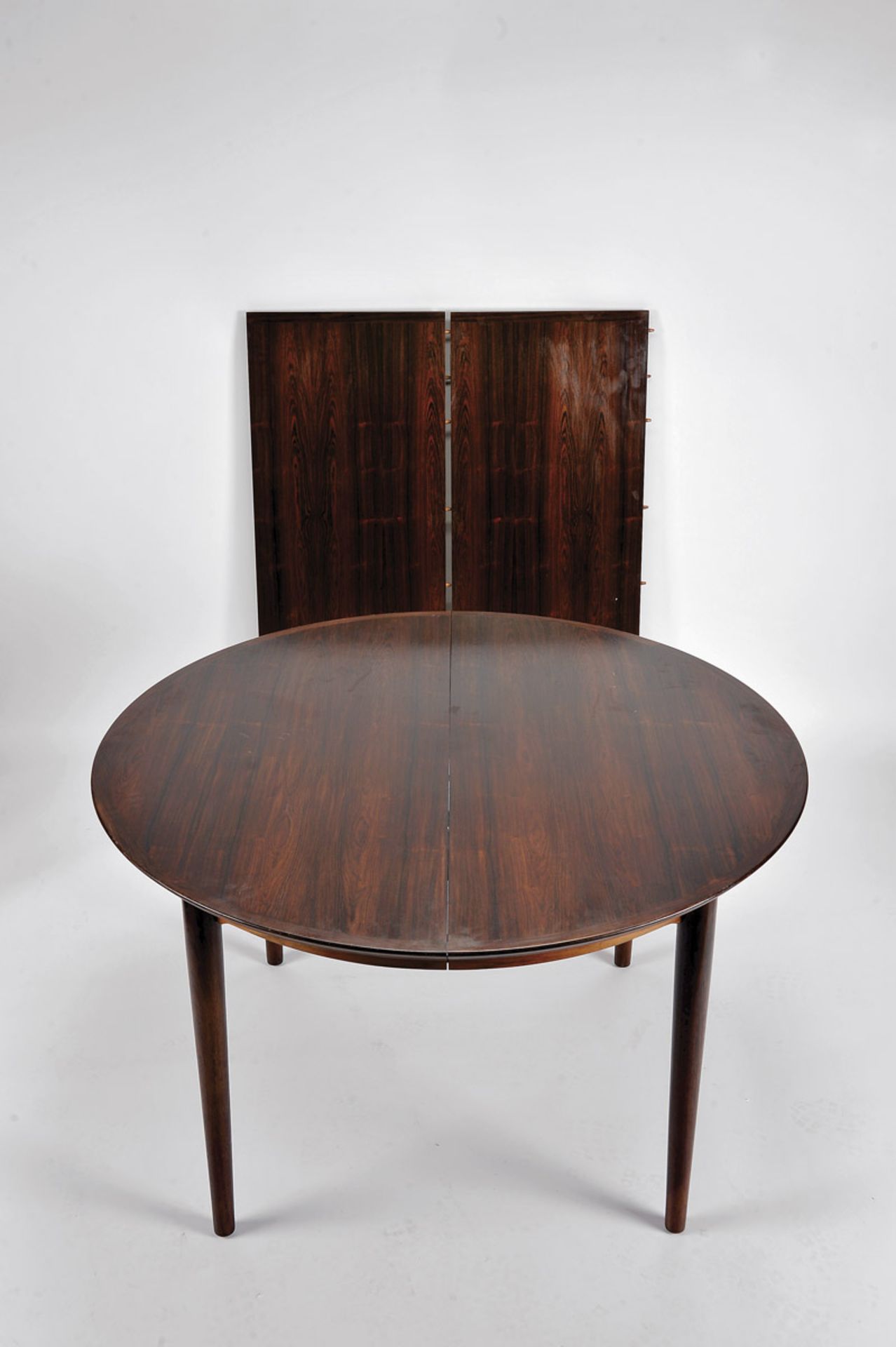 A Dining Room Table, Brazilian rosewood and Burr-Brazilian rosewood, two extension boards, Danish,
