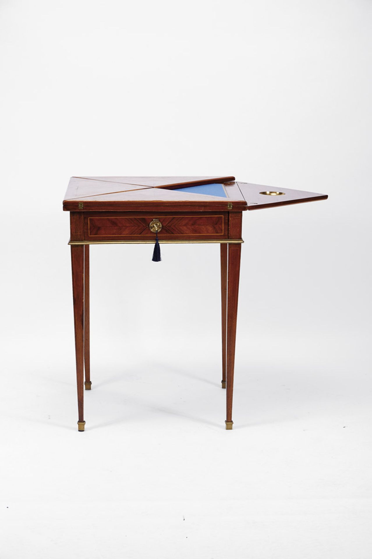 An Envelope Game Table, mahogany and mahogany veneer, satinwood fillets, metal applications, French,