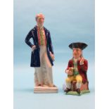 A Staffordshire Toby jug, seated gentleman with yellow breeches, 11in. and a Victorian Staffordshire