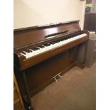 A Kemble Minx miniature piano, seven-octave keyboard and overstrung iron frame, mahogany case