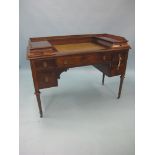 An early 20th century inlaid mahogany kneehole desk, inset leather top with two shallow drawers,
