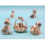 Four various Lladro porcelain dog models, and a Lladro cat and mouse group