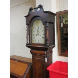 An early 19th century oak 8-day longcase clock, arched enamelled dial with subsidiary seconds,