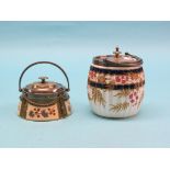 A Macintyre earthenware biscuit barrel, with silver plated mount, and a Spode biscuit barrel, both