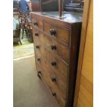 A Victorian mahogany chest, two short and four long drawers, each cock-beaded with turned wood