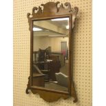 A George II-style burr-walnut mirror, rectangular with elaborate cresting, 2ft. 2in. high