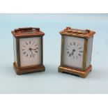 Two early 20th century French carriage clocks, each with enamelled dial and timepiece movement, in