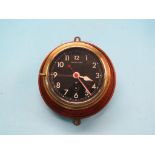 A ship's clock, official use, 4.25in. black dial with centre-seconds, dial no. 0552/461-9296, spun