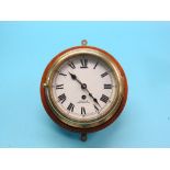 A Smith's ship's clock, 6in. enamel dial with centre-seconds, spun brass case, on mahogany mount,