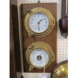 Two marine-type instruments, quartz clock and aneroid barometer, circular brass cases, on single oak