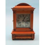 A Victorian light oak mantel clock, with square, silvered dial, French count-wheel movement, 13in.