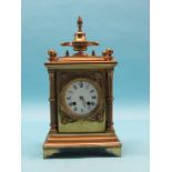 A 19th century brass mantel clock, with enamelled dial and French bell-striking movement, in