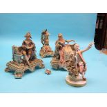 A pair of 19th century French earthenware figures, seated naval officer, seated female companion,