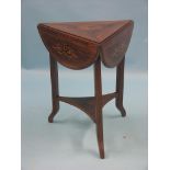 An Edwardian inlaid rosewood envelope table, top inlaid with leaf-scroll marquetry, with