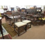 A good pair of gothic Chippendale mahogany dining chairs, camel-backs with tracery splats, drop-in