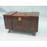 An Oriental camphorwood blanket chest, block-fronted with carved detail, brass lock without clasp,