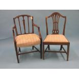 An Hepplewhite-period mahogany elbow chair, arched back with carved detail, and a similar single