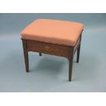 An Edwardian inlaid rosewood piano stool, hinged, upholstered seat above marquetry front panel,