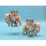 A pair of French bisque porcelain elephant models, each with howdah and attendant youth, 8in. - some