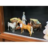 Two Beswick horses, Beswick fox, ear chipped, Goebel horse, Lladro girl with swan and two Royal