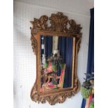 An early George II-style moulded gilt mirror