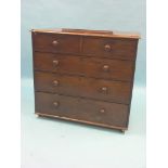 A Victorian mahogany chest, two short and three long drawers, each with turned wood knob handles,