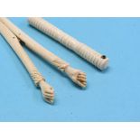 A pair of Victorian carved bone glove-stretchers, another pair, bone Stanhope needle case and a