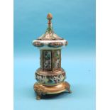 A Capodimonte-style musical carousel, on ormolu plinth with claw feet, 16in.