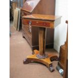 A Victorian mahogany games table, with inlaid chess-board top, single frieze drawer, octagonal