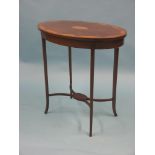 An Edwardian oval mahogany occasional table, top inlaid with batswing segments in satinwood, 2ft.