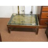 A brass-bound mahogany coffee table, with inset atlas, together with three brass floor-lamps