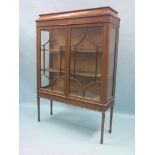 An Edwardian inlaid mahogany display cabinet, pair of astragal-glazed doors enclosing lined interior