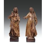 Coppia di figure in legno scolpito e parzialmente dorato rappresnetanti l’Annunciazione, scultore