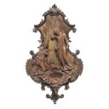 Acquasantiera in legno riccamente intagliato e scolpito con motivi a pellacce. Europa XVIII