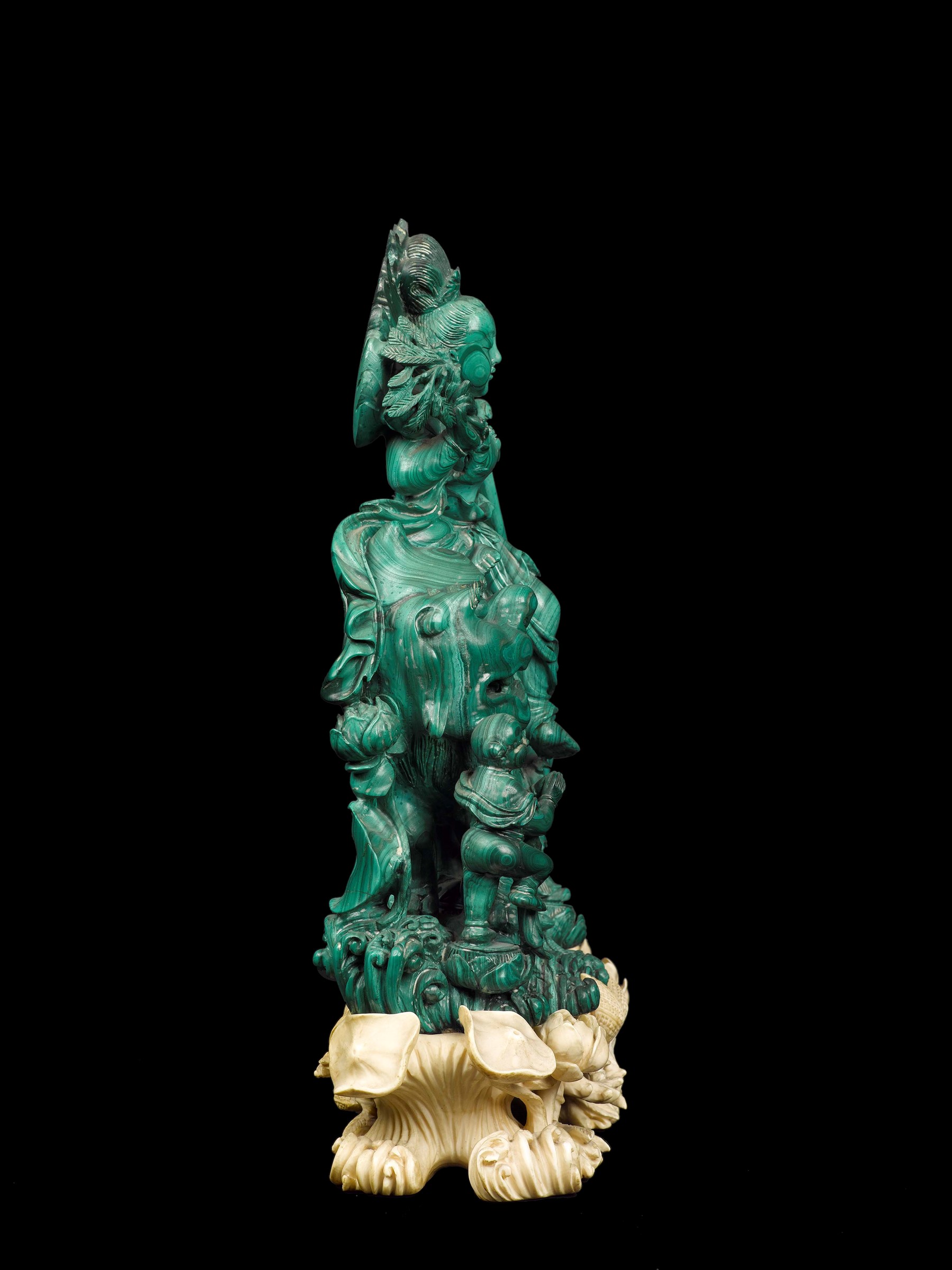 A finely carved malachite group with Guanyin on a Pho dog and children with carved ivory stand, - Image 2 of 3