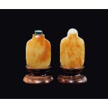 Two squared white and russet jade snuff bottles, China, Qing Dynasty, 19th century h cm 7 e cm 7,5