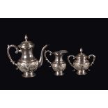 A silver set: a coffeepot, a sugar bowl and a milk jug, China, Qing Dynasty, 19th century h da cm 14