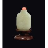 A white jade snuff bottle with coral stopper, China, Qing Dynasty, 19th century h cm 7,5