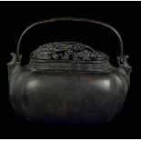 A bronze hand warmer, China, Ming Dynasty, 17th century apocryphal Xuande mark