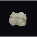 A carved withe jade figure of Pho dog, China, Qing Dynasty, 18th century cm 5