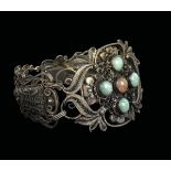 A silver filigree bracelet with jadeite and rose quartz inlays, China, Qing Dynasty, 19th century cm