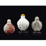 Three different glass snuff bottles, China, Qing Dynasty, 19th century h cm 6, cm 6,5, cm 7,5