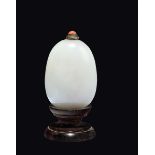 A white jade snuff bottle with silver and coral stopper, China, Qing Dynasty, Qianlong Period (