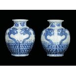 A pair of blue and white vases with dragons, China, Qing Dynasty, 19th century apocryphal Qianlong