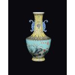 A polychrome enamelled porcelain double handled vase with naturalistic decoration, China,