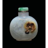 A white and russet agate snuff bottle with jadeite stopper depicting wise man and bats, China,