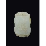 A white jade pendant with child and inscription, China, Qing Dynasty, 18th century cm 7,5
